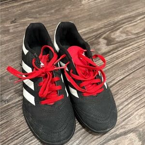 Kid’s Adidas Black Cleats with Red Laces